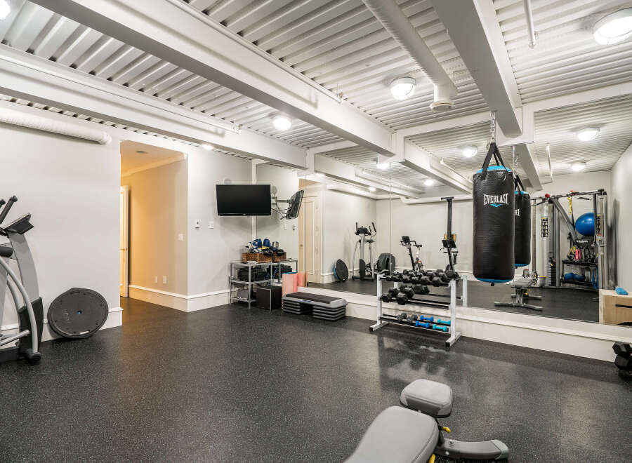 This stunning home gym offers a dedicated space for fitness enthusiasts.