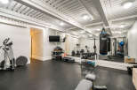 This stunning home gym offers a dedicated space for fitness enthusiasts.