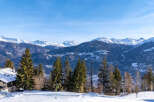 Experience the ultimate in alpine living with this stunning property, offering breathtaking views of snow-capped mountains.