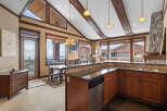 This stunning kitchen boasts a seamless blend of rustic charm and modern elegance.