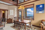 This stunning dining room boasts a warm and inviting atmosphere, perfect for entertaining guests or enjoying family meals.