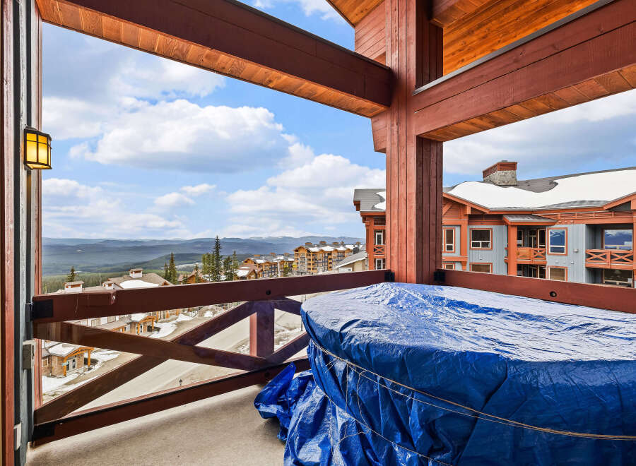 Enjoy breathtaking mountain views from this stunning balcony.
