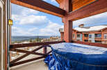 Enjoy breathtaking mountain views from this stunning balcony.