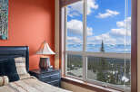 Enjoy breathtaking mountain views from this cozy bedroom.