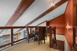 This stunning property boasts a unique loft area, perfect for a dining or relaxation space.