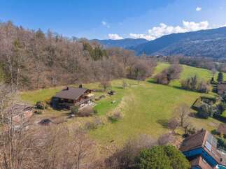 Nestled in a picturesque landscape, this stunning property offers a serene retreat.