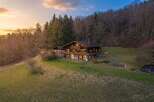 Nestled in a serene natural setting, this stunning property offers a perfect blend of luxury and tranquility.
