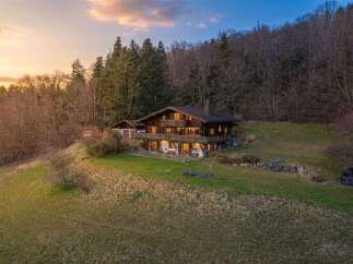 Nestled in a serene natural setting, this stunning property offers a perfect blend of luxury and tranquility.