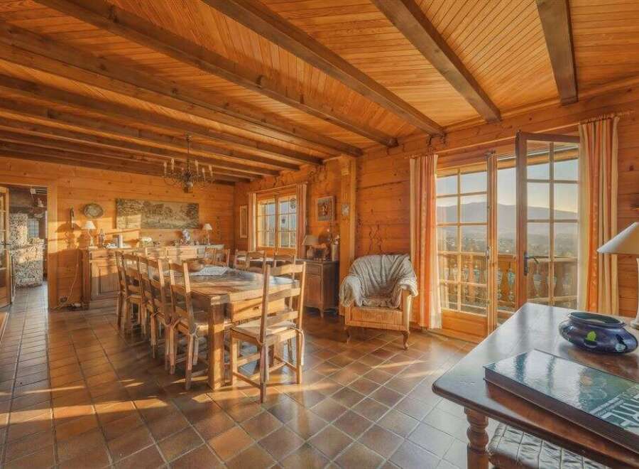 Step into a world of rustic elegance with this stunning property, showcasing a warm and inviting interior.