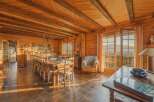 Step into a world of rustic elegance with this stunning property, showcasing a warm and inviting interior.