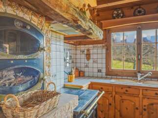 Step into the charm of this rustic kitchen, a perfect blend of traditional design and modern comfort.