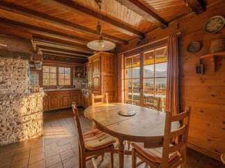 Step into this charming, rustic kitchen, perfect for those who appreciate a cozy and inviting atmosphere.