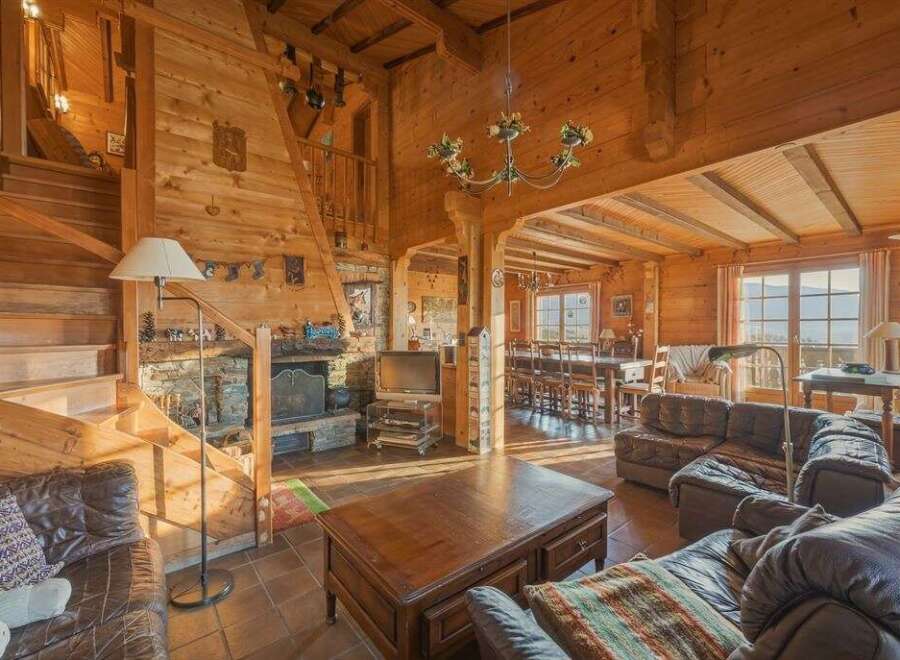 Step into a cozy and inviting log cabin retreat, perfect for a relaxing getaway.