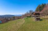 Nestled on a hillside, this charming property offers breathtaking views and a tranquil escape.