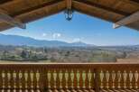 Enjoy breathtaking mountain views from this charming property.