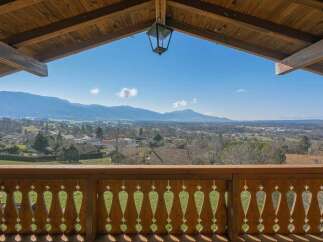 Enjoy breathtaking mountain views from this charming property.