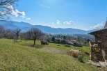 Enjoy breathtaking mountain views from this charming property.