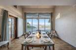 Experience the charm of this elegant dining room, perfect for hosting memorable gatherings.