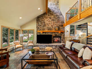 This stunning living room features a cozy fireplace, perfect for chilly evenings.