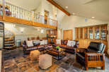 This stunning property boasts a spacious living area with a loft, perfect for entertaining or relaxing.