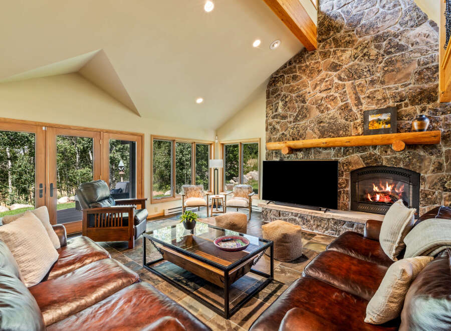 Experience the epitome of rustic luxury in this stunning living room.