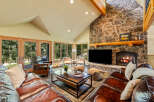 Experience the epitome of rustic luxury in this stunning living room.