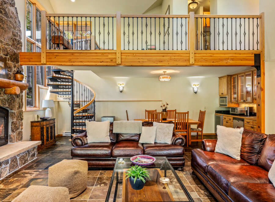 Experience luxury living in this stunning property featuring a cozy fireplace, perfect for chilly evenings.