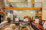 Experience luxury living in this stunning property featuring a cozy fireplace, perfect for chilly evenings.