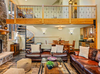 Experience luxury living in this stunning property featuring a cozy fireplace, perfect for chilly evenings.