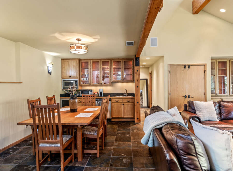 This stunning property boasts a beautifully designed kitchen and dining area, perfect for entertaining guests or enjoying family meals.