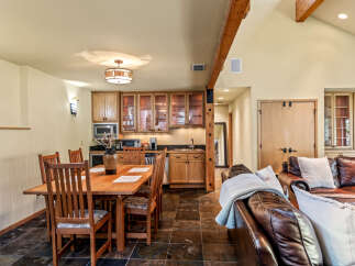 This stunning property boasts a beautifully designed kitchen and dining area, perfect for entertaining guests or enjoying family meals.