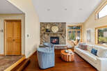 This stunning living room features a cozy stone fireplace, perfect for relaxing evenings.