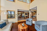 This stunning property boasts a spacious living area with high ceilings and abundant natural light.