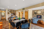 This stunning property boasts a spacious dining area, perfect for hosting gatherings.
