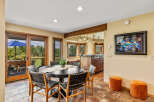 This stunning dining area boasts a modern aesthetic with a touch of rustic charm.