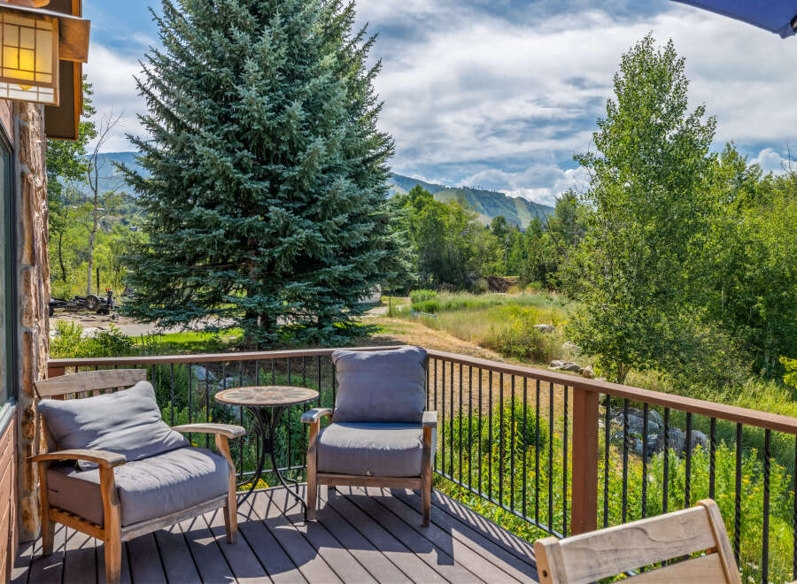 Enjoy breathtaking views from this stunning outdoor deck.