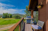 Enjoy breathtaking views from this stunning property! This home features a spacious deck with a grill, perfect for outdoor entertaining.