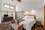 Experience luxury in this stunning bedroom featuring a plush bed, perfect for relaxation.