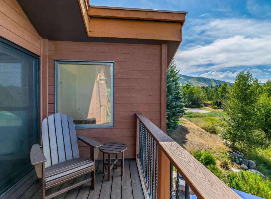 Enjoy breathtaking views from this charming balcony.