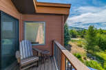 Enjoy breathtaking views from this charming balcony.