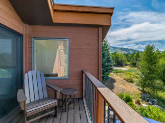 Enjoy breathtaking views from this charming balcony.