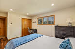 This cozy bedroom offers a tranquil retreat with its inviting ambiance and thoughtful design.