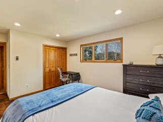 This cozy bedroom offers a tranquil retreat with its inviting ambiance and thoughtful design.
