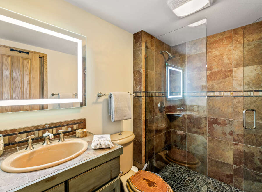 This bathroom features a stylish design with a modern touch.