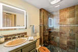 This bathroom features a stylish design with a modern touch.