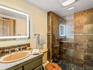 This bathroom features a stylish design with a modern touch.
