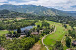 This stunning property boasts a picturesque golf course and a serene lake, offering a perfect blend of luxury and natural beauty.