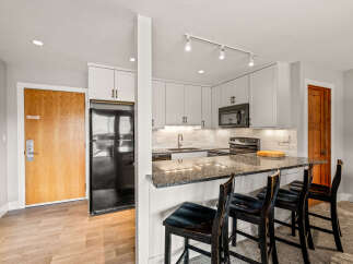 This stunning kitchen boasts modern design and functionality.