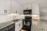 This stunning kitchen boasts modern design and functionality.