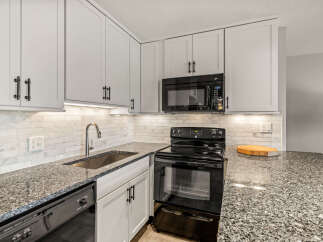 This stunning kitchen boasts modern design and functionality.